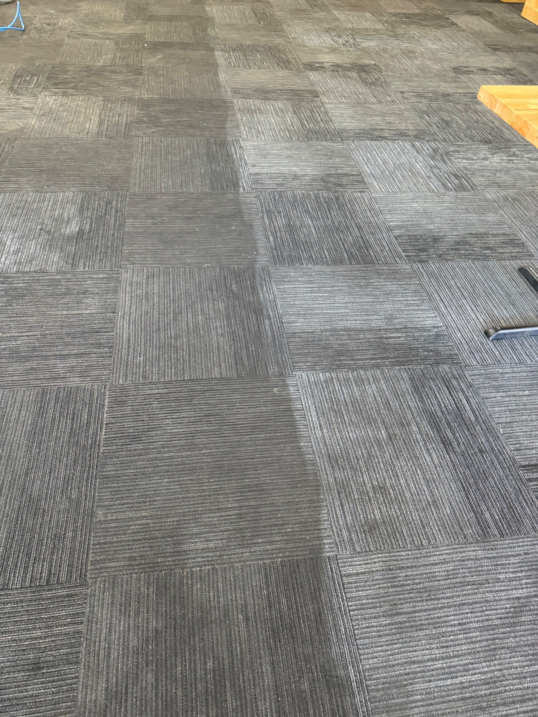 Carpet tile back to an even tone by Sennings Cleaning Services, Inc. Springfield